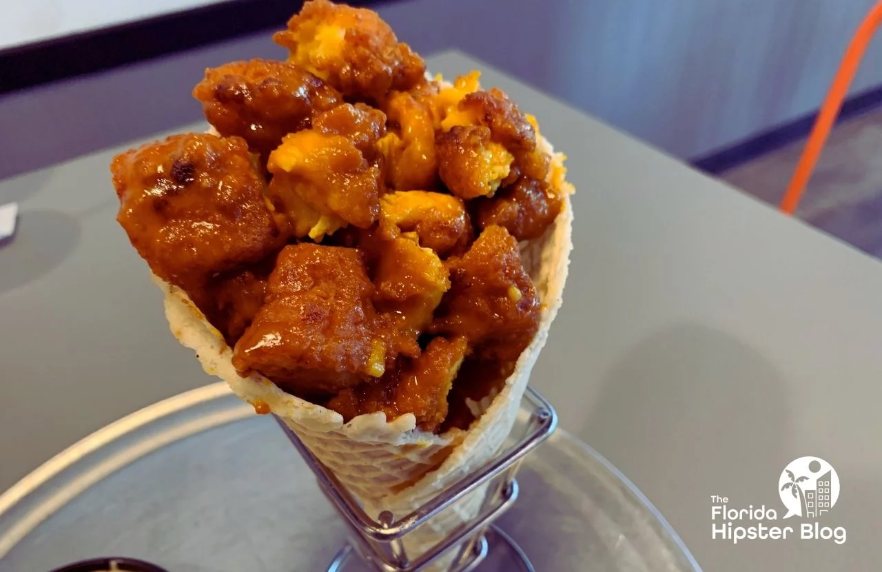 Chick'n'Cone Restaurant in Winter Park, Florida Fried Chicken in Waffle Cone. Keep reading to get the best lunch in Orlando!