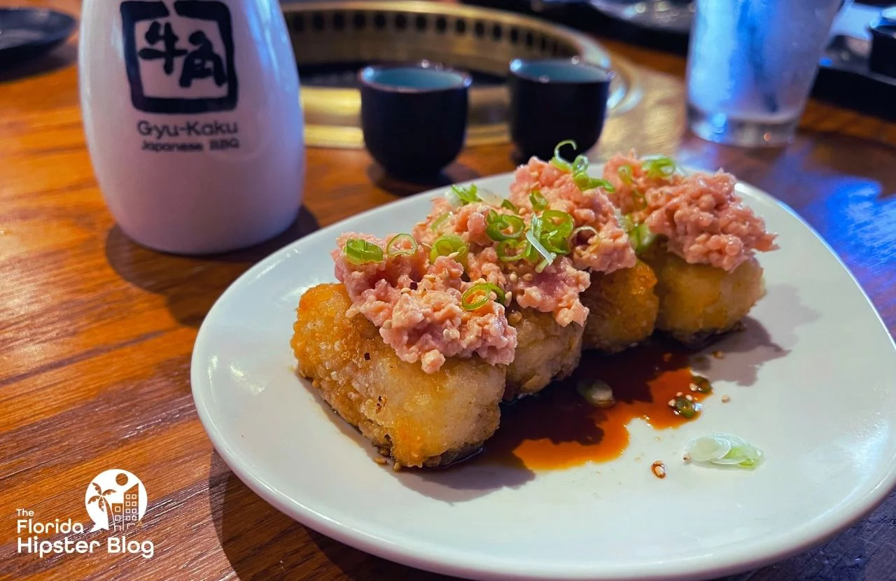 Gyu-Kaku Japanese BBQ Dining Restaurant in Orlando, Florida Fried Rice Ball with Tuna on Top. Keep reading to get the best lunch in Orlando!