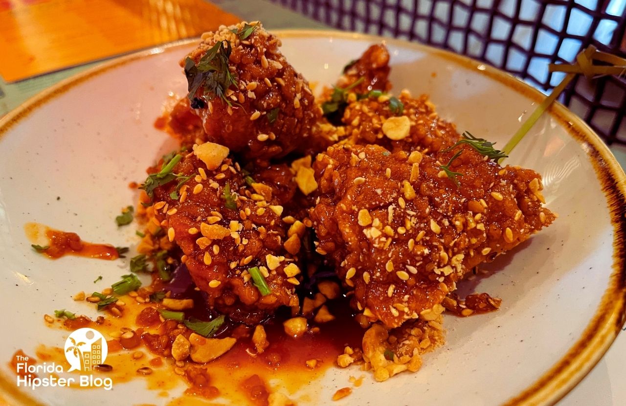 Hawkers Asian Street Food Restaurant in Orlando, Florida Fried Japanese Chicken. Keep reading to get the best lunch in Orlando!