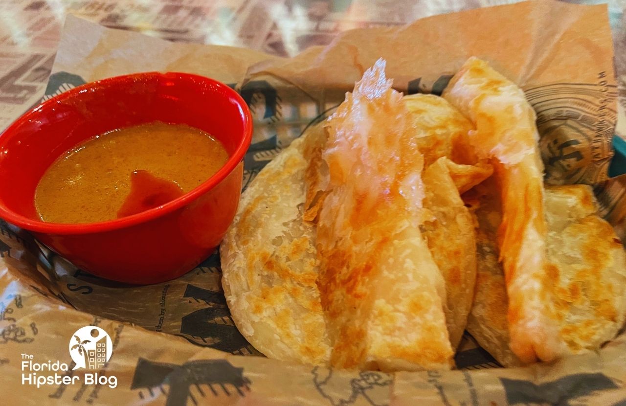 Hawkers Asian Street Food Restaurant in Orlando, Florida Roti with Sauce. Keep reading to get the best lunch in Orlando!