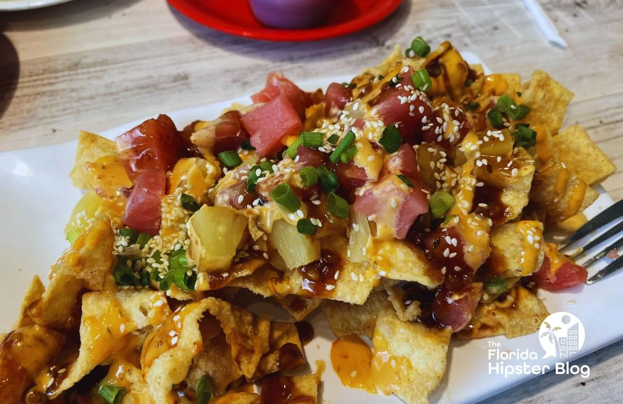 Island Wing Company Loaded Tuna Nachos. Keep reading to get the best wings in Orlando, Florida.