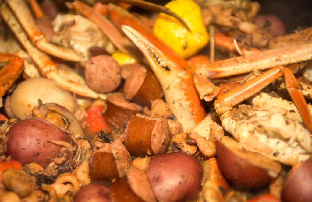 Crab legs, potatoes, and sausage at LA Boiling Seafood Crab & Crawfish in Orlando, Florida. Keep reading for more places to get the best crab legs in Orlando, Florida.