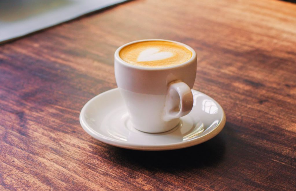 One of the best coffee shops in Tampa, Florida. Spaddy's Coffee Co .  and a cup of coffee with latte art of a heart. Keep reading to find out more about the best coffee in Florida. 