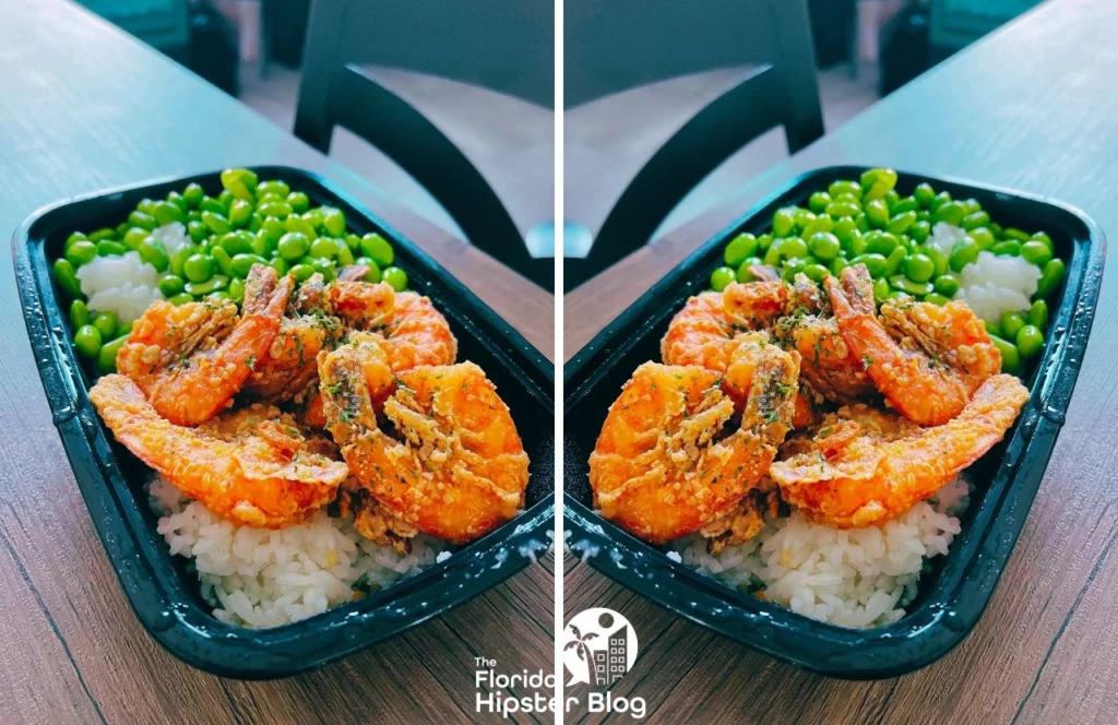 Poke Hana Restaurant in Orlando fried shrimp with edamame peas and white rice. Keep reading to get the best lunch in Orlando!