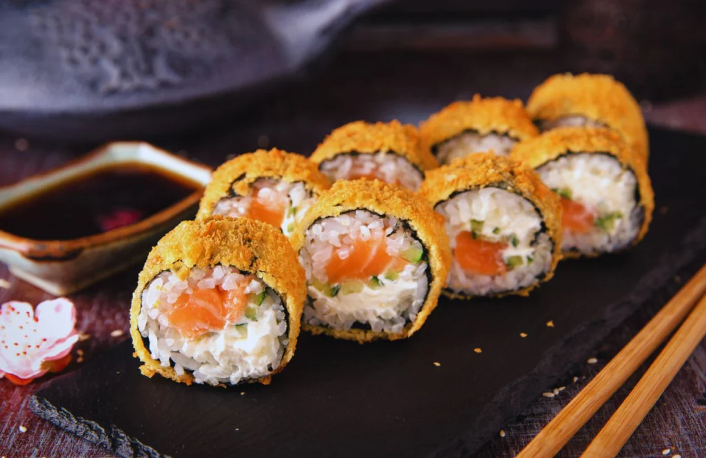 A sushi roll sits on a tray at Soho Sushi in Tampa, Florida. Keep reading for more places to get the best sushi in Tampa, Florida.