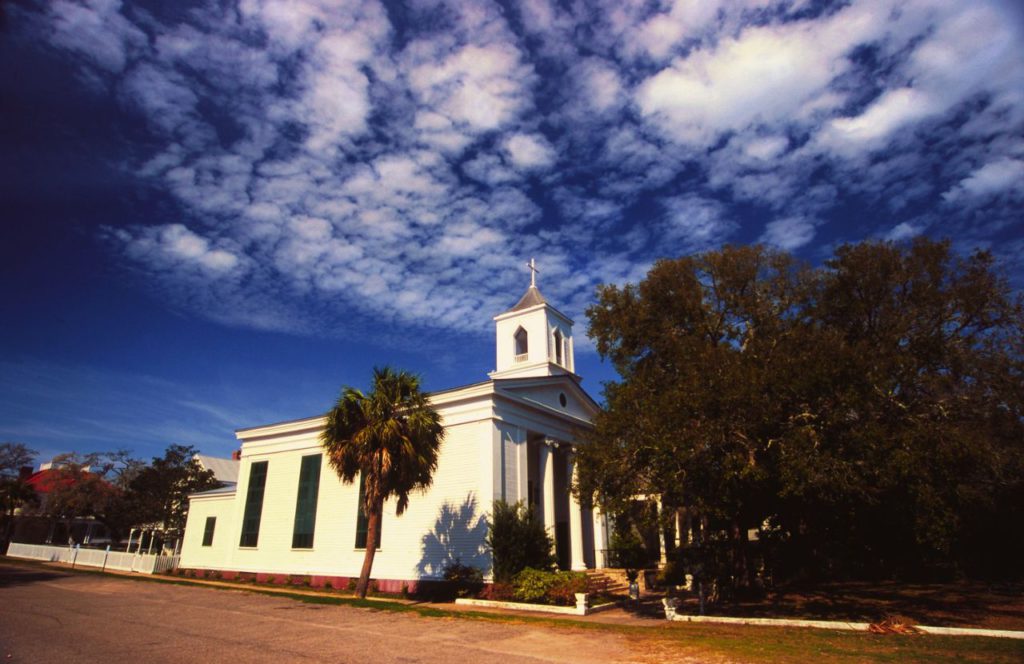 White church in downtown Apalachicola, Florida One of the best things to do in the Florida Panhandle.