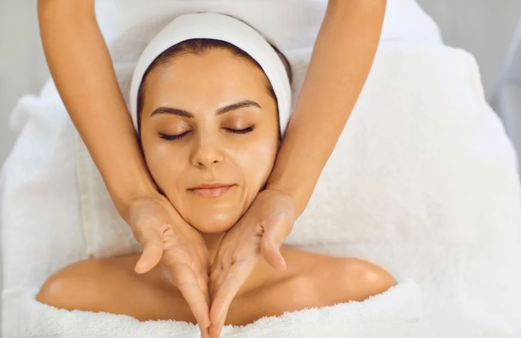 Lady getting a facial at Pallavi Spa at Wyndham Grand in Clearwater Beach, Florida. Keep reading to find out more about the best Tampa day spas.