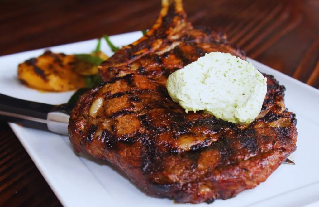 T Bone Steak with Garlic Butter on Top Charley's Steakhouse This a best steakhouse in Tampa, Florida and one of the best places to get steak