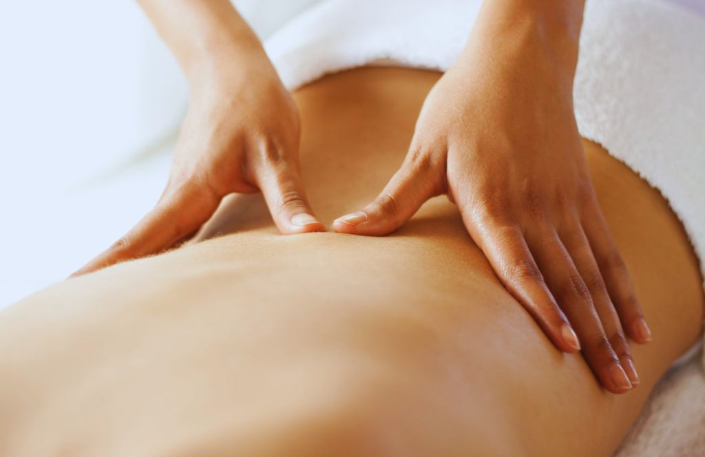 Woman getting a massage at Cielo Spa One of the Best Day Spas in Tampa, Florida. Keep reading to find out more about the best Tampa day spas. 