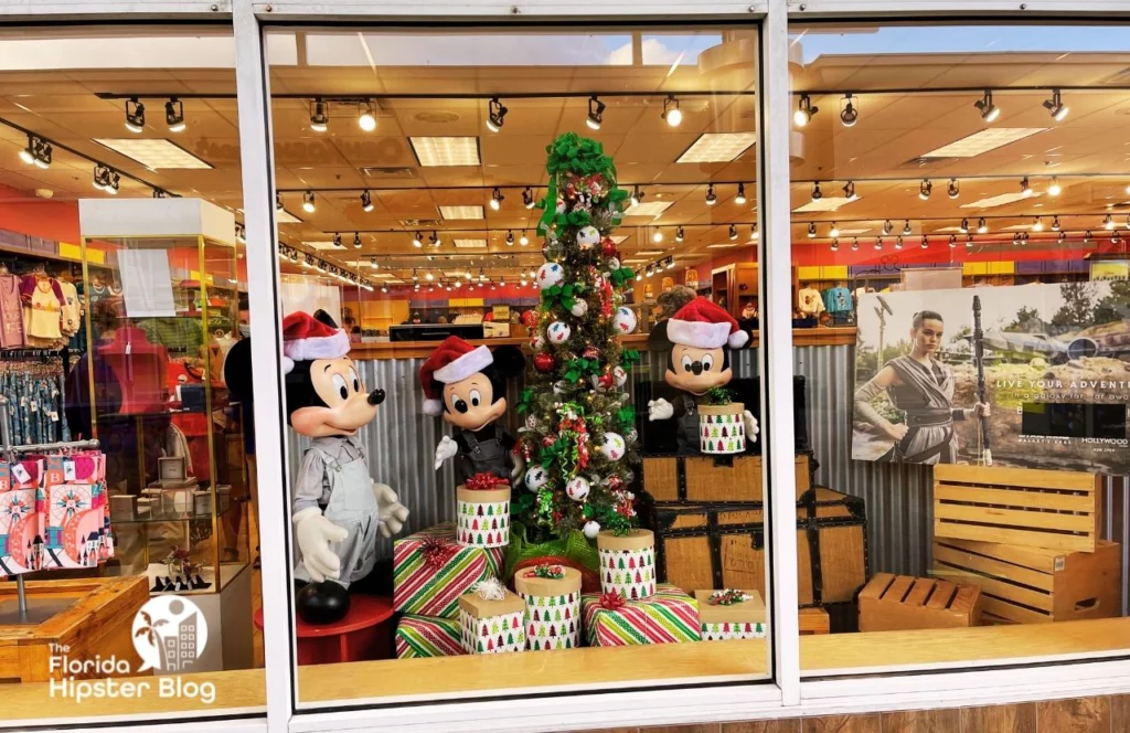 Disney Character Warehouse Store at Christmas with Mickey Mouse and Nephews in the window. Keep reading to find out all you need to know about the best Florida Christmas gift ideas. 