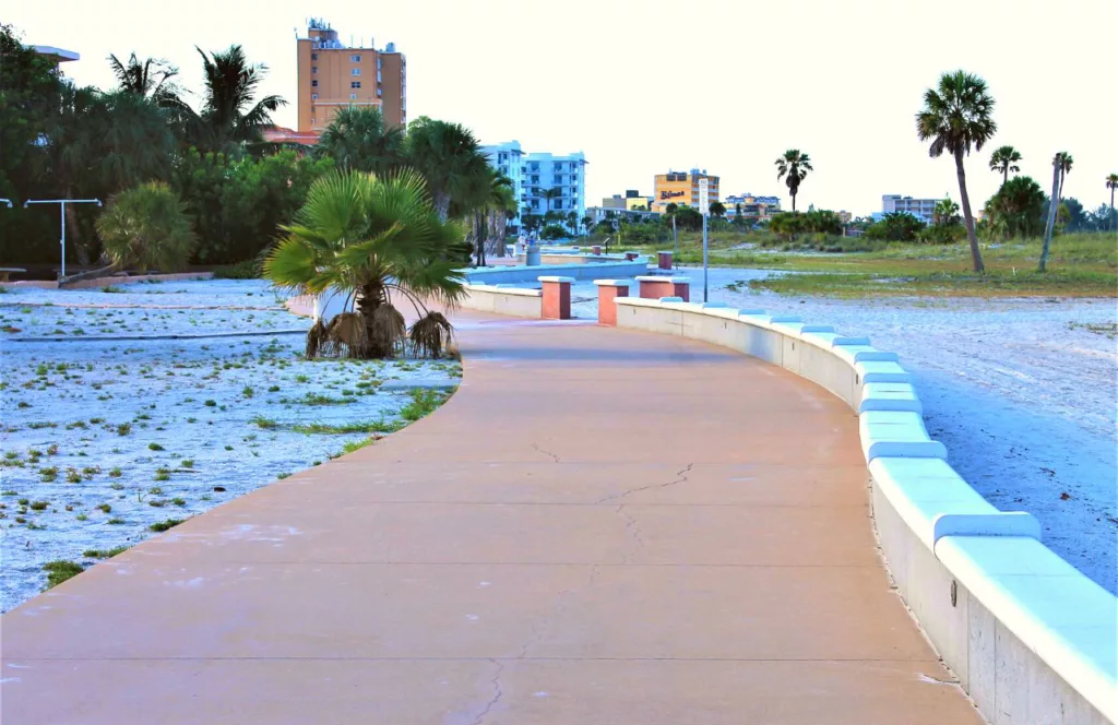 Walking Path with hotels along the beach. One of the best things to do in Treasure Island, Florida