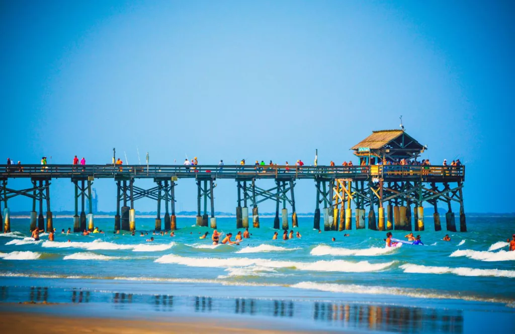 Cocoa Beach Florida on a Sunny Day. Keep reading to learn about shark watching in Florida and how to avoid attacks