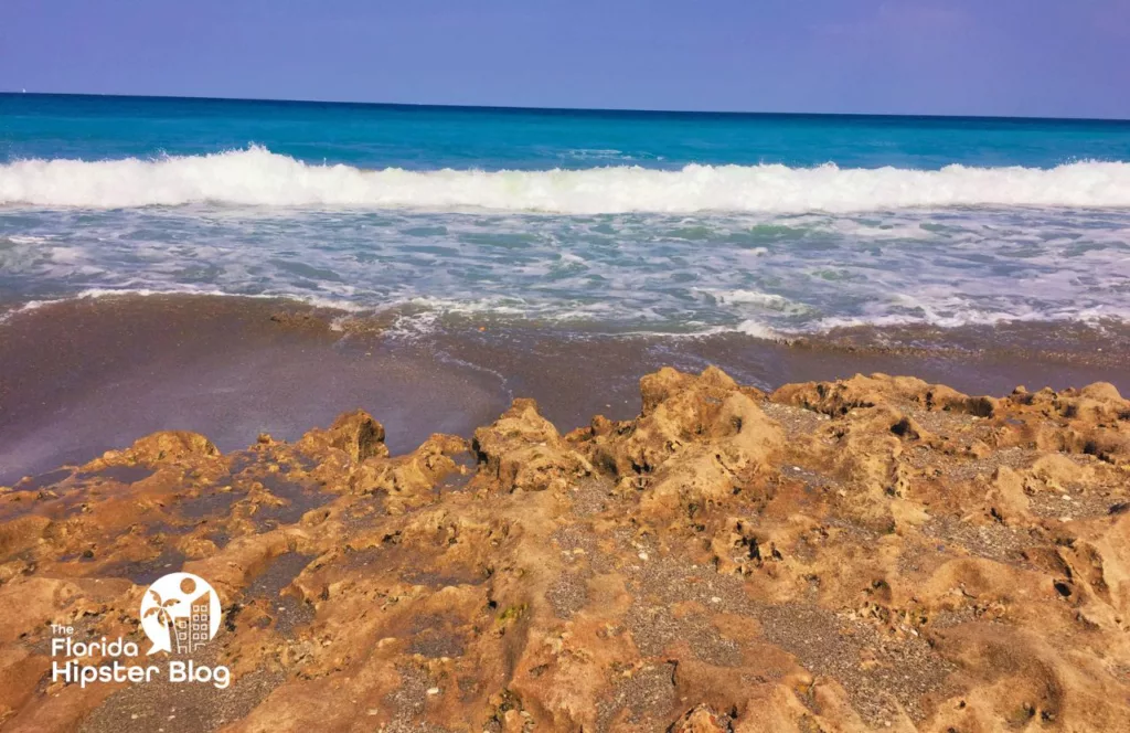 Jupiter Beach Florida Splashing Rocks. Keep reading to get the best beaches in florida for bachelorette party.
