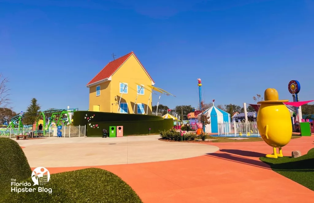 Peppa Pig Theme Park Florida House in front of Mr Potato