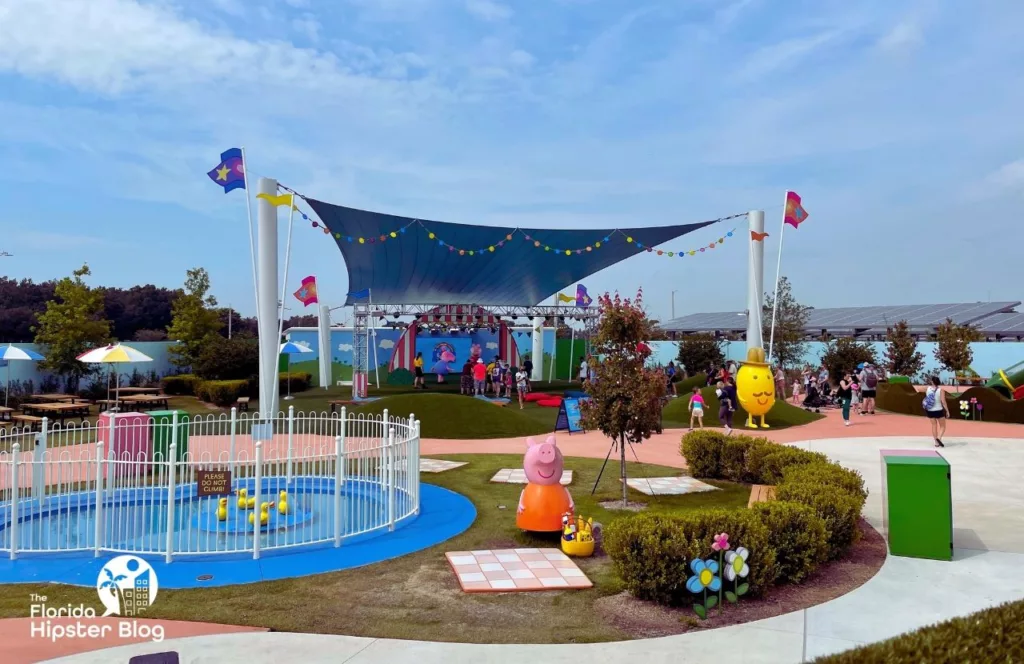 Peppa Pig Theme Park Florida Show area behind Mommy Pig's Picnic area. Keep reading to discover what to do at Peppa Pigs Theme Park.  