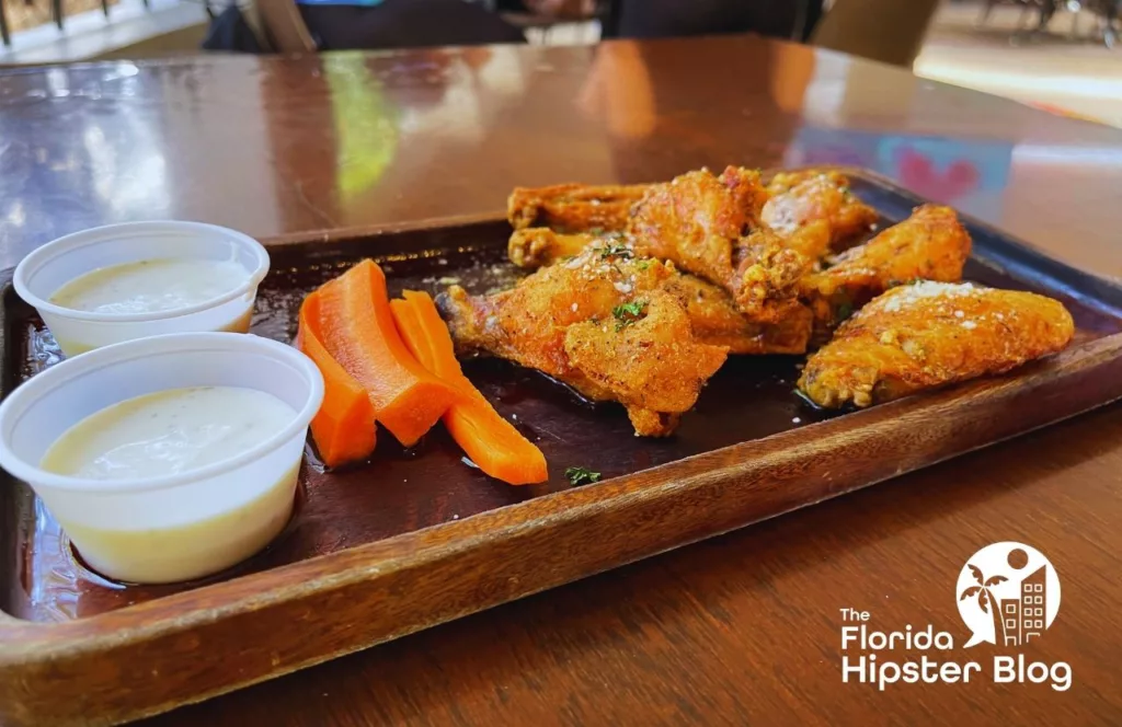 Teak Neighborhood Grill Restaurant in Orlando, Florida Parmesan Garlic Wings. Keep reading to get the best wings in Orlando, Florida.