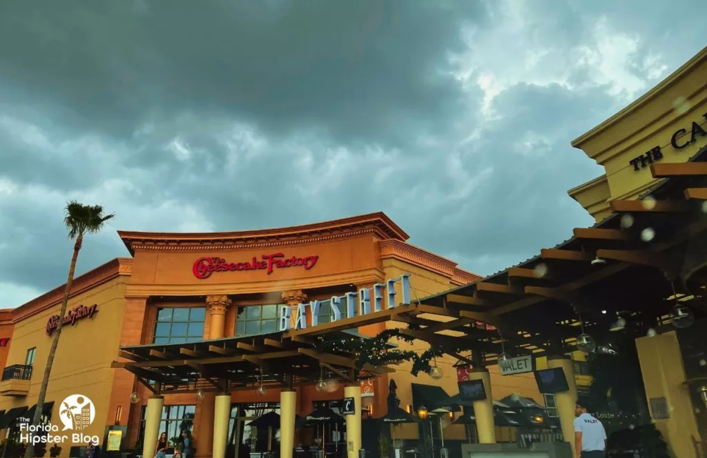 Cloudy and Rainy day at The Cheesecake Factory in International Plaza Mall in Tampa Bay, Florida. Keep reading to the get the best rain ponchos for travel.