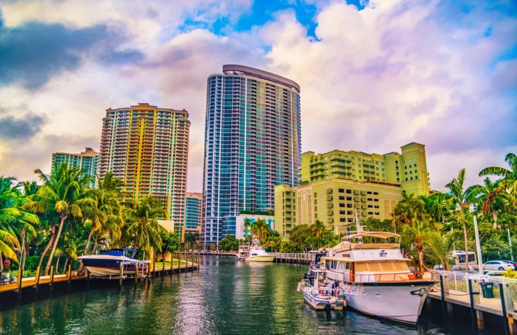 Downtown Fort Lauderdale, Florida skyline by waterway. Keep reading to learn about the best Florida beaches for a girl's trip!