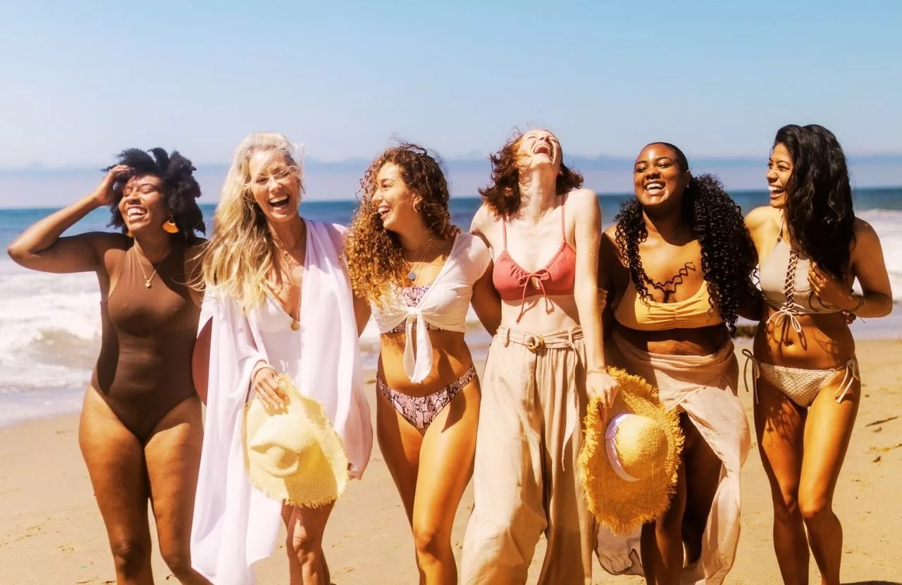 Girls Weekend on a Florida Beach with friend walking on the sand