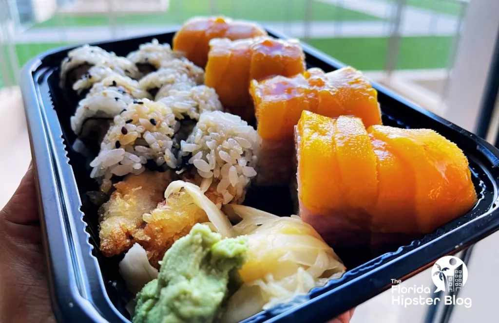 Shrimp tempura roll and mango roll in a takeout container. Keep reading to find out where to go for the best sushi in Tampa. 