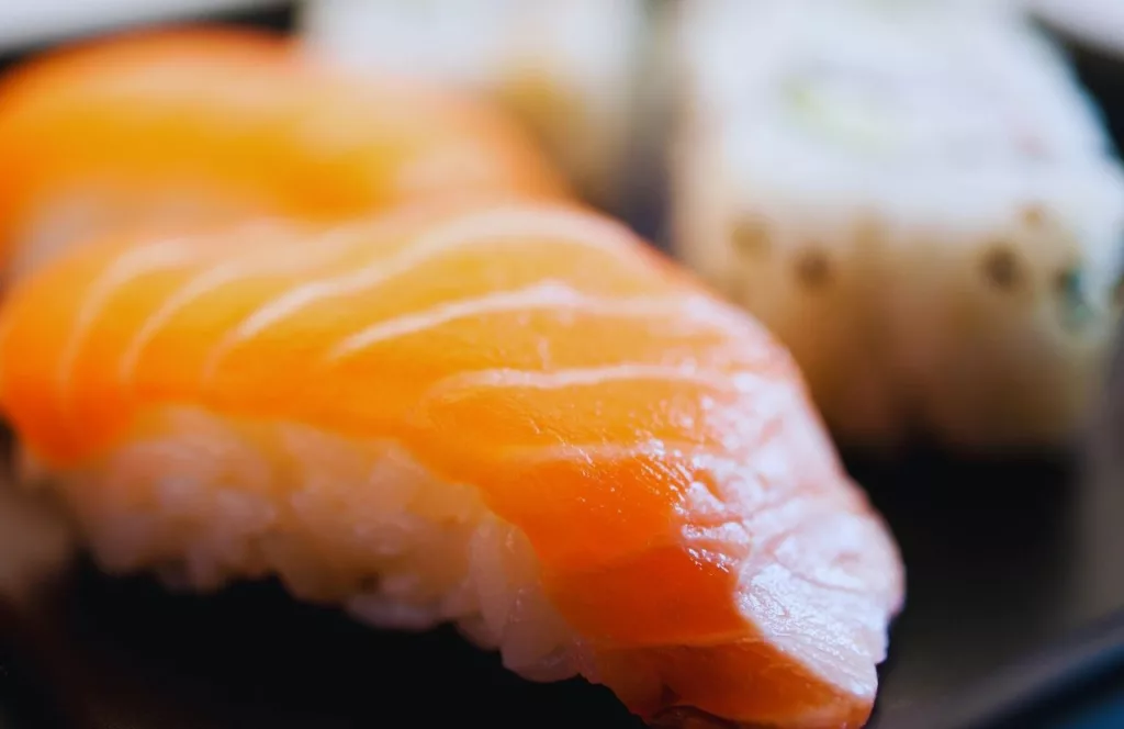 Close up of Salmon Nigiri, Keep reading to find out all you need to know about the best Japanese food in Orlando. 