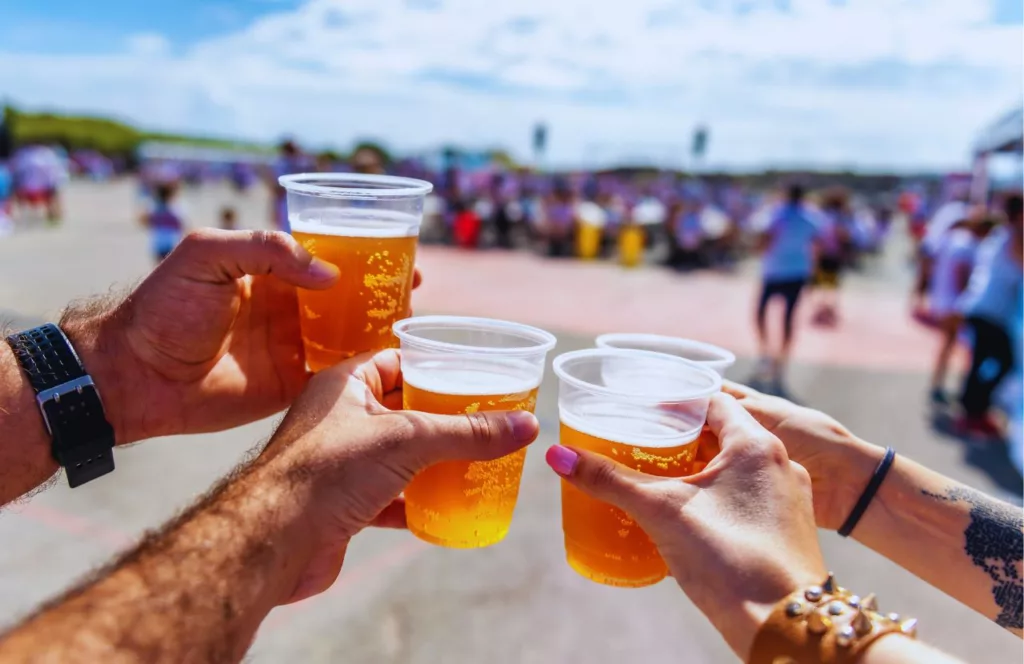 Riverside Craft Beer Festival with friends toasting. Keep reading to get fun and free things to do in Jacksonville, Florida.