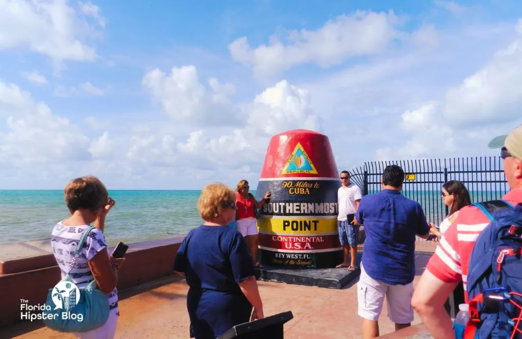 Key West, Florida Southernmost Point 90 miles to Cuba famous statue. Keep reading to learn about the expert Florida Travel writers on Florida Hipster blog.