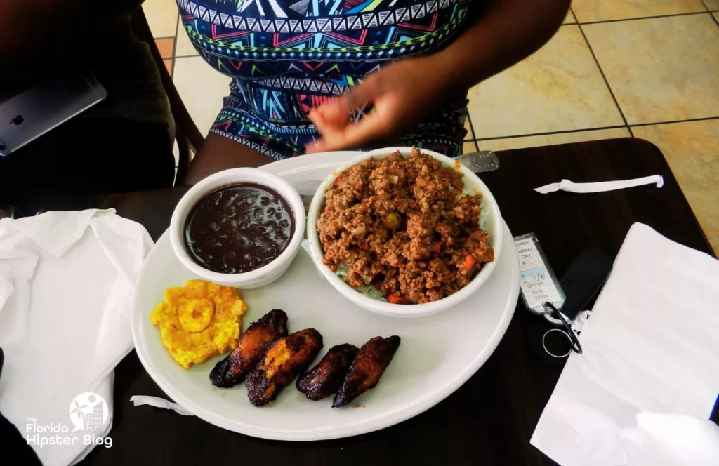 Naples, Florida beef picadillo with tostone sweet plantains with black beans. Keep reading to get the best beaches in florida for bachelorette party.