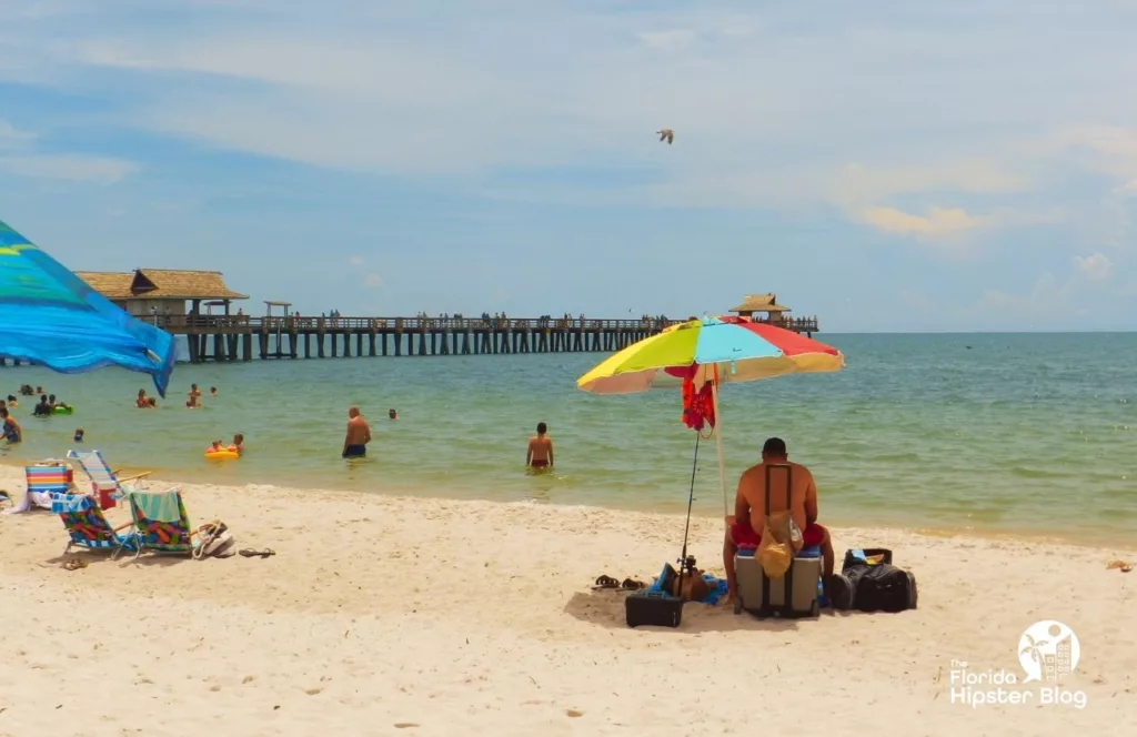 Naples, Florida pier at the beach. One of the best things to do for Memorial Day in Florida.. Keep reading to find out more things to do on Florida Memorial Day weekend.  