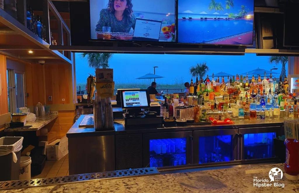 Margaritaville Beach Hotel Landshark Bar and Grill bar area. Keep reading to discover all there is to know about Margaritaville Beach Hotel Jacksonville.