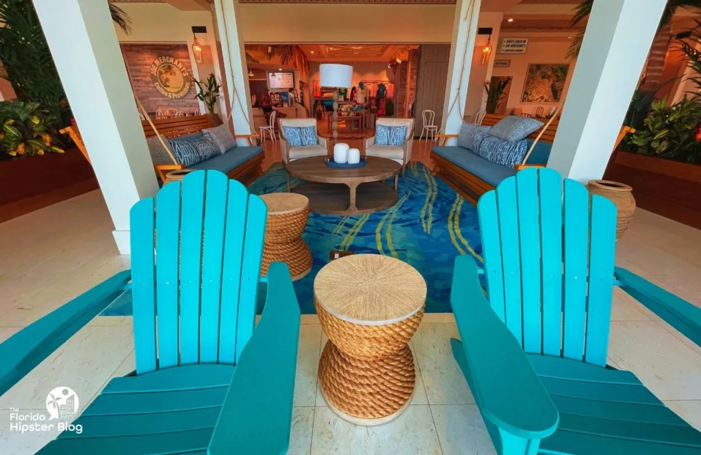 Margaritaville Beach Hotel Lobby  with Adirondack style beach chairs and beach bungalow décor. Keep reading to discover all there is to know about Margaritaville Beach Hotel Jacksonville.