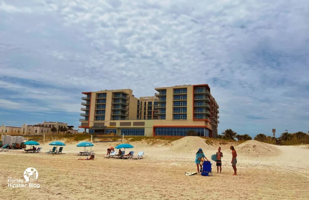 Margaritaville Beach Hotel view from the beach. Keep reading to discover more about Margaritaville hotel Jax Beach.