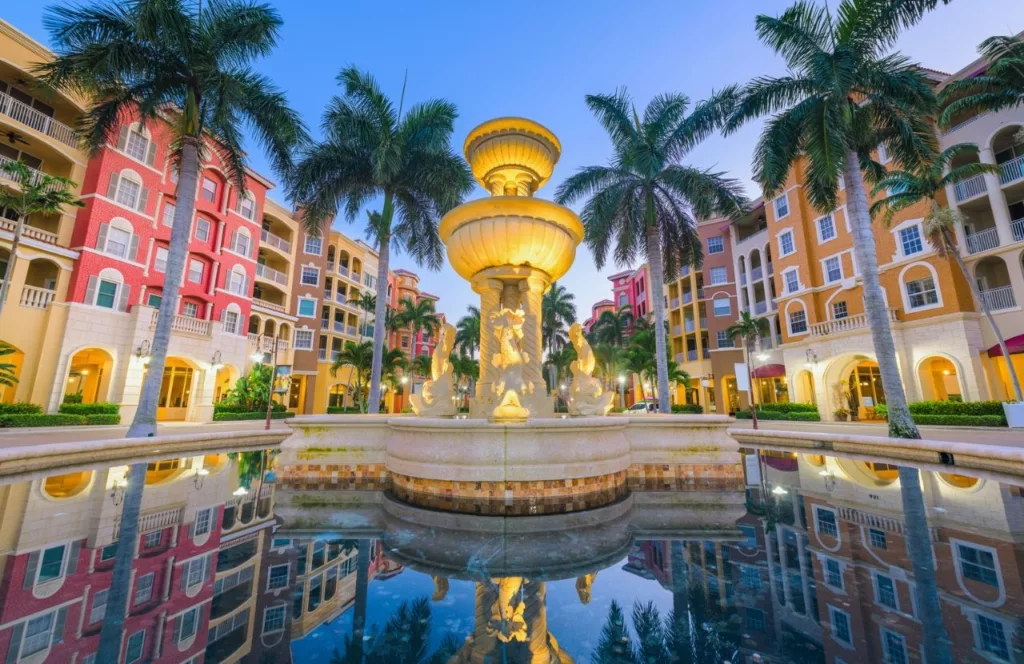 Plaza in Naples, Florida at night after a wonderful day of great brunch with friends.. Keep reading to find out all you need to know about Naples brunch. 