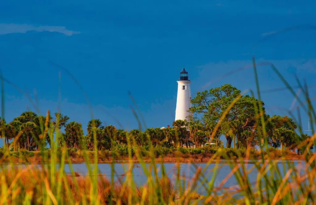 St. Marks Wildlife Refuge Lighthouse on the Gulf of Mexico coastline. Keep reading to get the best things to do in the Florida Panhandle