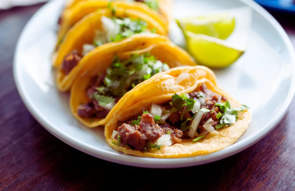 TacoSon birria tacos with lime. Keep reading to get the best lunch in Tampa, Florida