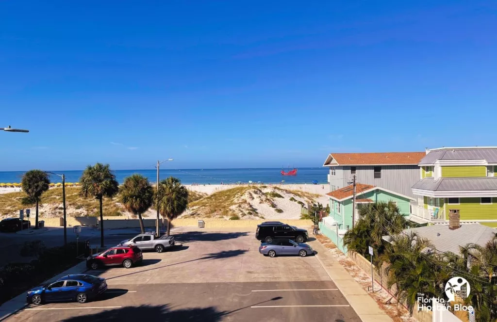 The Avalon Hotel in Clearwater. Gulf of Mexico beach View from the balcony with red Pirate ship. Keep reading to get the best west central Florida beaches.