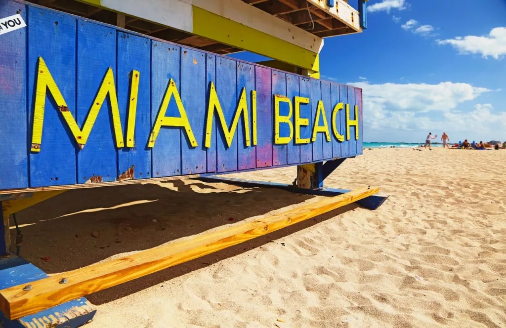 Welcome to Miami Beach, Florida blue sign. Keep reading to learn about the best Florida beaches for a girl's trip!