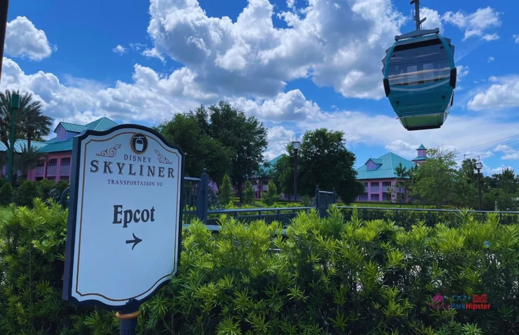 Disney Riviera Resort Epcot skyliner sign Caribbean Beach Club. Keep reading to learn how to How to Get From Epcot to Hollywood Studios for your Disney vacation.