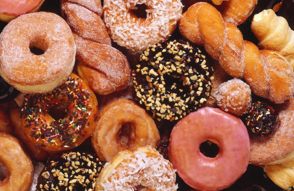 An assortment of delicious doughnuts from the Donut Hole. One of the best places to get breakfast in Panama City Beach, Florida. Keep reading to learn more about the best breakfast in Panama City Beach, Florida.