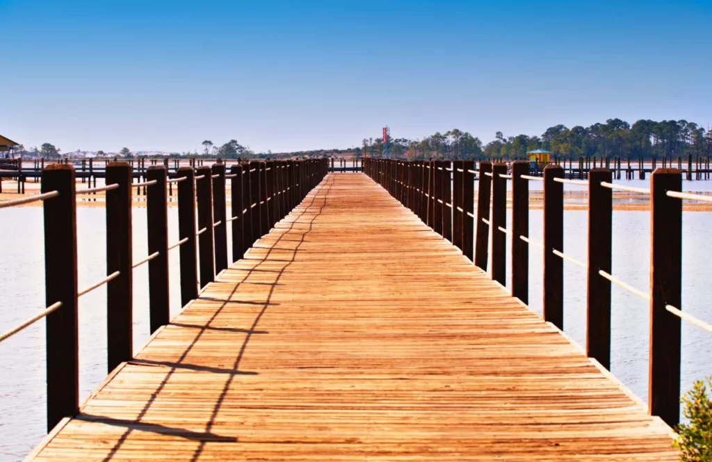 Pier at St Andrews State Park. Keep reading to get the Full Guide to Snorkeling in Panama City Beach, Florida.