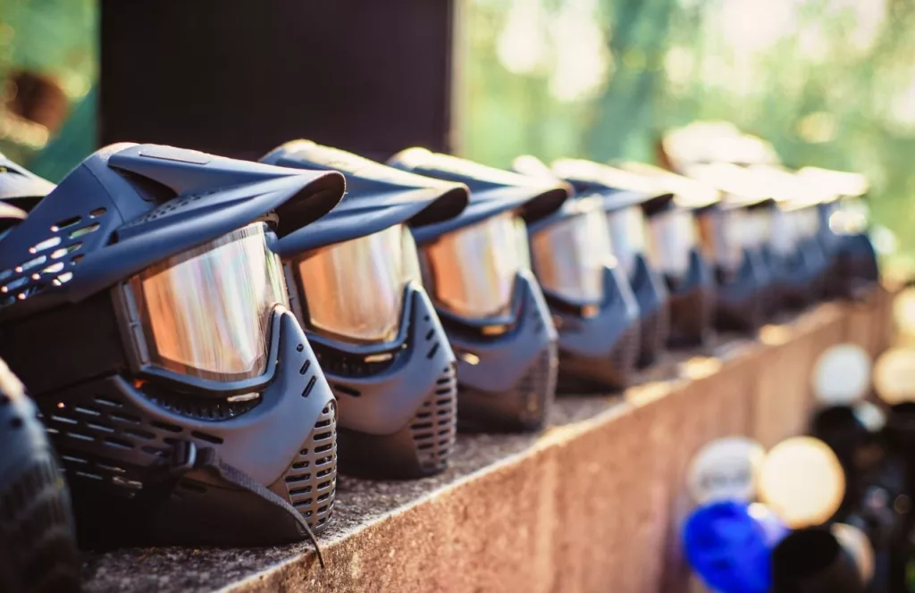 Warrior Sports Park with helmets lined up. One of the Best Paintball Fields in Orlando, Florida. Keep reading to get the full guide on the best paintball fields in Orlando, Florida.