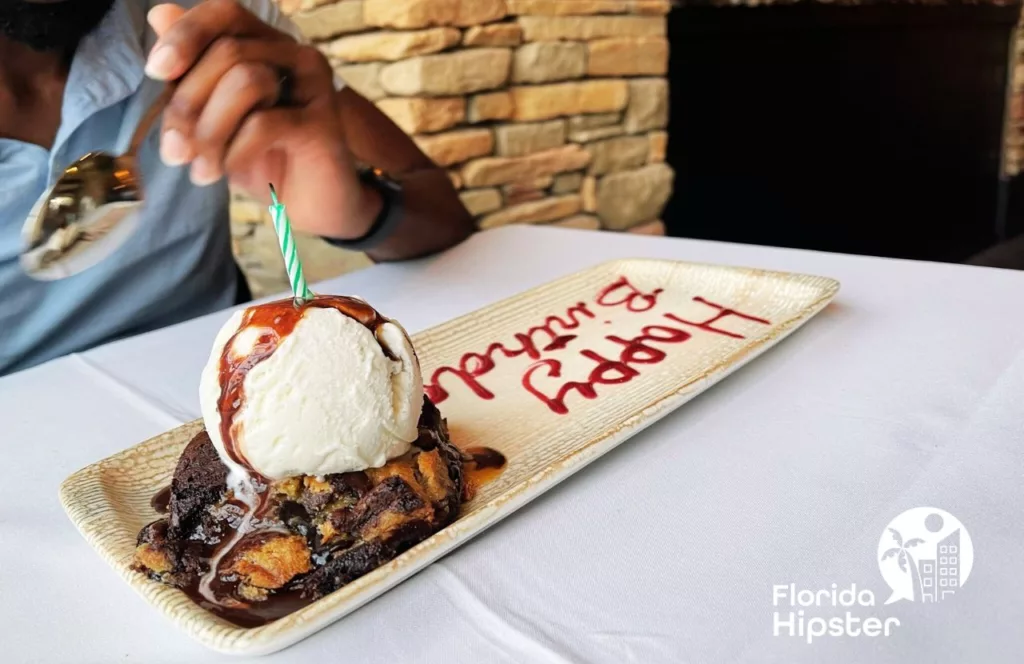 7593 Chophouse at Reunion Resort steakhouse birthday celebration. Keep reading to learn more about where to go for the best steak in Orlando.