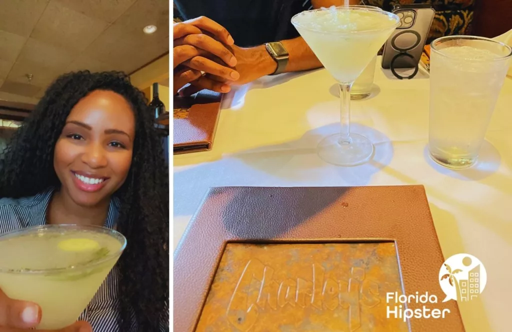 NikkyJ enjoying a drink at Charley's Steakhouse and Seafood Grill. Keep reading to find out all you need to know about Orlando steakhouses.