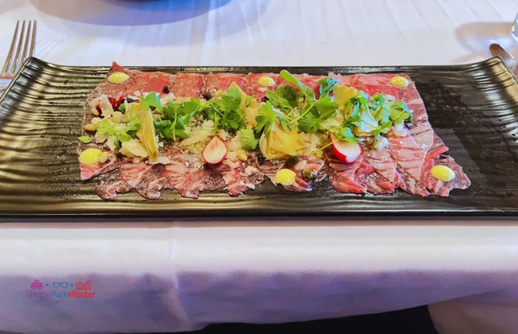 Yachtsman-Steakhouse-Yacht-and-Beach-Club-Resort-Walt-DIsney-World-Beef-Carpaccio. Keep reading to discover where to go for the best steak in Orlando.