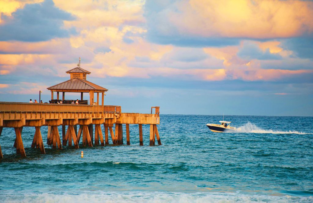 Boat sailing near International Pier at Deerfield Beach, Florida