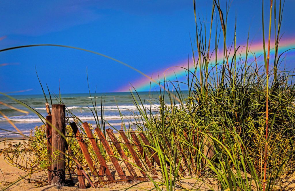 New Smyrna Beach with Rainbow. One of the Best Beaches in Florida in May