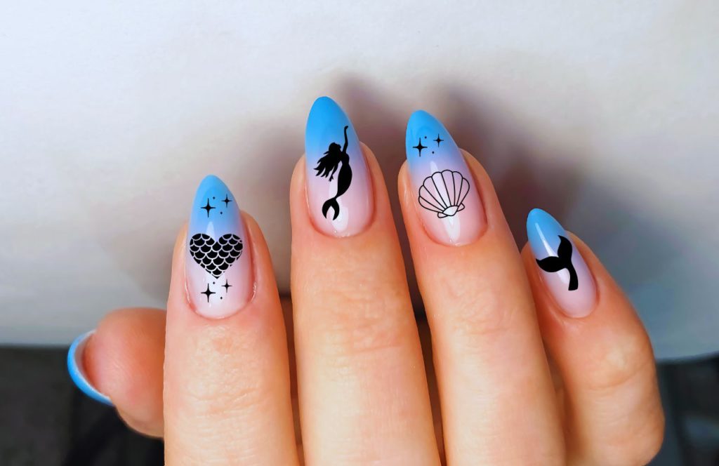 Florida Beach Nails Blue Mermaid Nails. Keep reading for the full guide to the best beach nail designs for your Florida beach vacation.