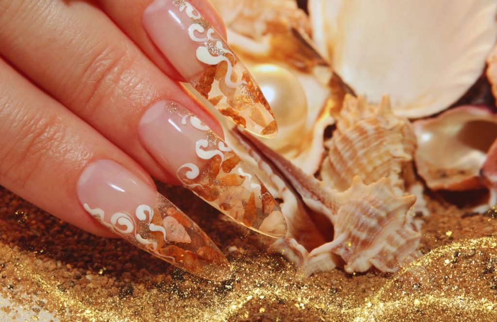 Florida Summer Beach Shell Nails. Keep reading for the full guide to the best beach nails for your Florida beach vacation.