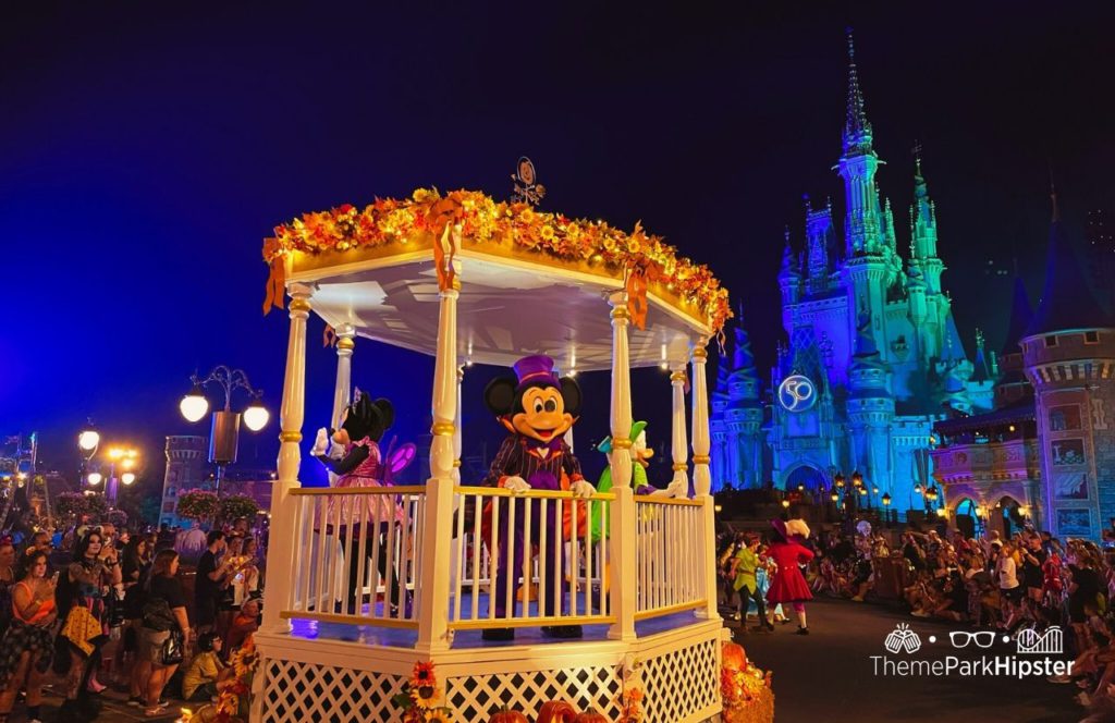 Mickey's Not So Scary Halloween Party at Disney's Magic Kingdom Theme Park Boo to You Halloween Parade in front of Cinderella Castle with characters Mickey and Minnie Mouse 